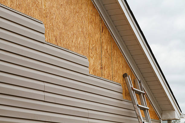 Professional Siding Replacement technician working in Liberty, IN